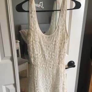 Cream/white lace dress.